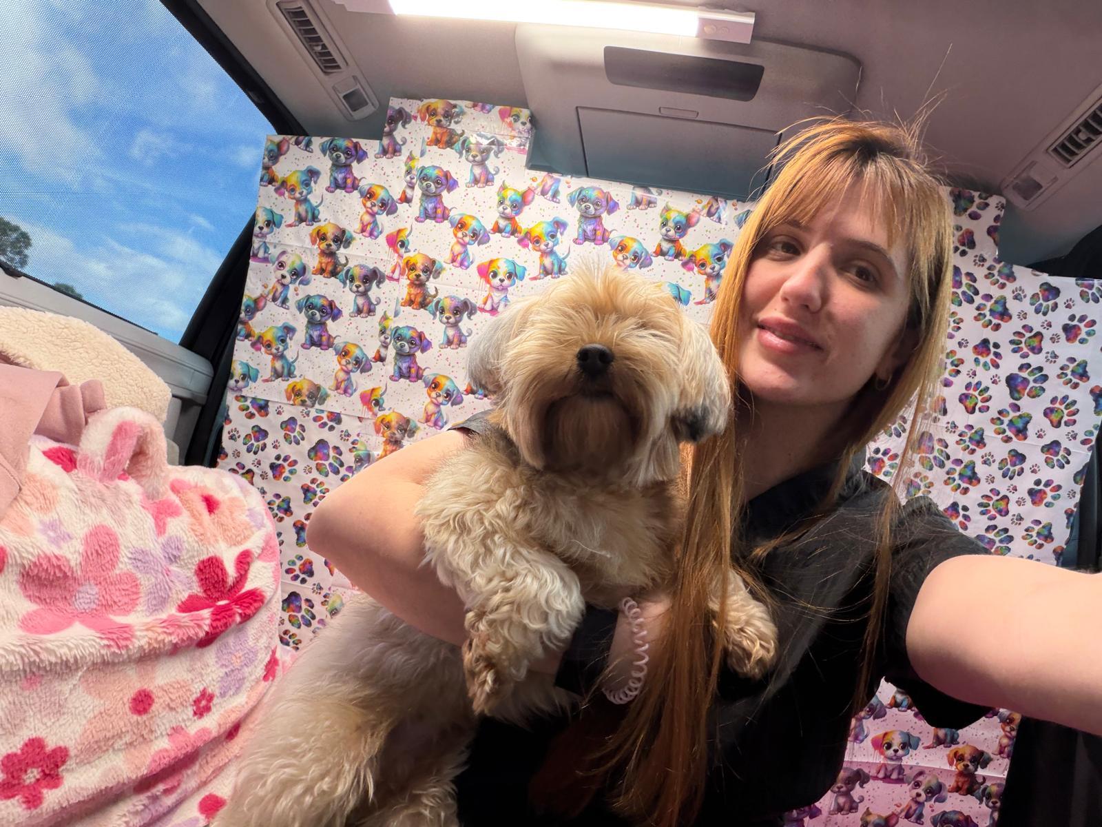 Professional dog trainer with a happy dog