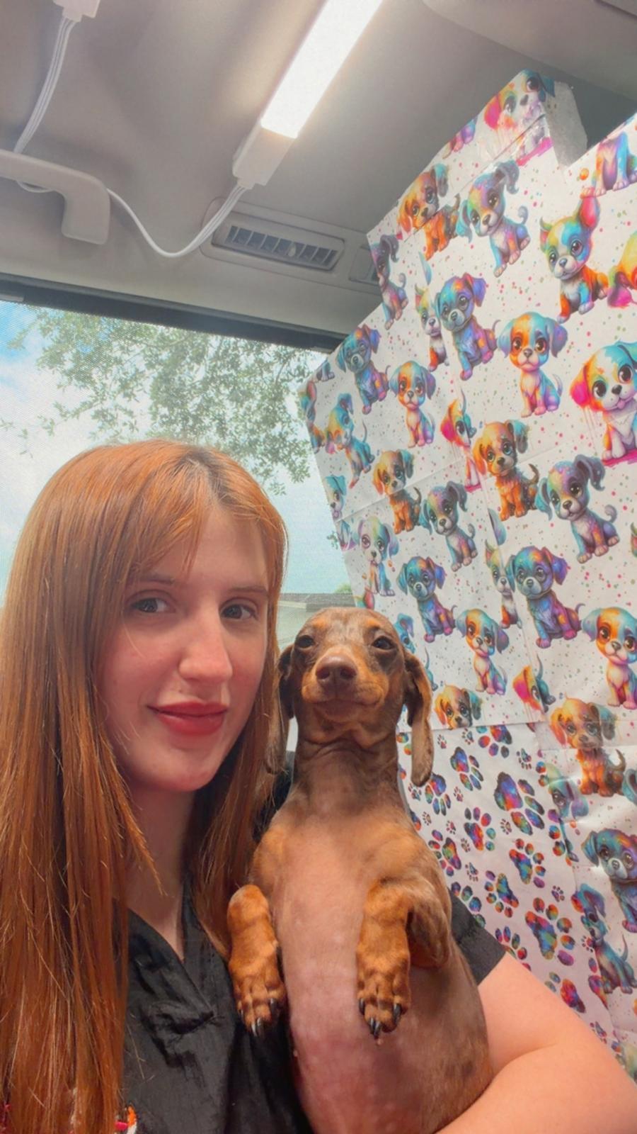 Yanet training a dachshund
